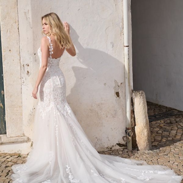 Rebecca Ingram 31 Sottero and Midgley Elka fit-and-flare wedding dress with intricate detailing in blush tones.